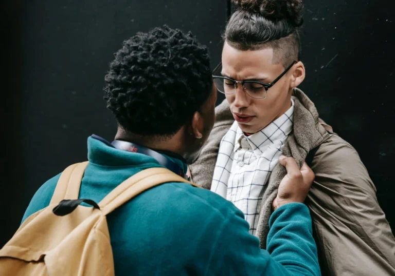 Bully assaulting fellow student at school.