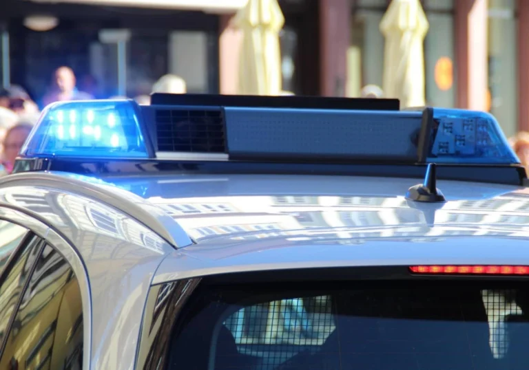 Police car making a traffic stop for a possible DUI charge in Georgia.